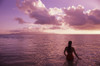 Fiji, Wakaya Island, Woman In Ocean Silhouetted At Sunset. PosterPrint - Item # VARDPI1985844