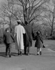 Family with two children walking in park Poster Print - Item # VARSAL255422203