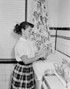 Teenage girl washing dishes in kitchen sink Poster Print - Item # VARSAL255422164
