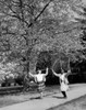 Vintage photograph of girls jumping with jump-rope in park Poster Print - Item # VARSAL25515662
