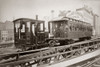 1880s Men On Board Elevated Locomotive & Passenger Car On East 42Nd Street Grand Union Hotel In Background New York City - Item # PPI195700LARGE