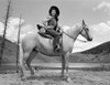 Portrait of cowgirl on horse Poster Print - Item # VARSAL255421173