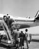 Passengers boarding an airplane Poster Print - Item # VARSAL25540490