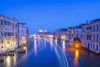 Light trails on a canal at dusk with the illuminated Salute church in the distance; Venice, Veneto, Italy PosterPrint - Item # VARDPI2413840