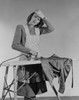 Portrait of housewife ironing Poster Print - Item # VARSAL255419723