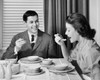 Young couple having breakfast at home Poster Print - Item # VARSAL2552974B