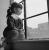 Little girl looking out window Poster Print - Item # VARSAL255424401