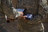 A soldier is presented the American Flag and certificate during a ceremony Poster Print - Item # VARPSTSTK104851M