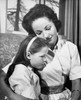 Close-up of a mid adult woman hugging her daughter Poster Print - Item # VARSAL25519789