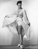 Young woman posing with holding her robe Poster Print - Item # VARSAL2552398B