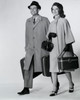 Mid adult couple walking with luggage Poster Print - Item # VARSAL25544352