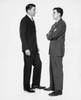 Two mid adult businessmen standing face to face Poster Print - Item # VARSAL25548051