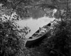 Woman relaxing in canoe Poster Print - Item # VARSAL255422724