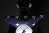 June 24, 2010 - An unidentified U.S. Airman assigned to the Base Honor Guard, stands at attention after completing the flag dressing sequence at Ellsworth Air Force Base, San Diego, California Poster Print - Item # VARPSTSTK104639M