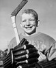 Close-up of a boy holding a hockey stick smiling Poster Print - Item # VARSAL2554078