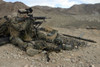 Marine Corps Air-Ground Combat Center Twentynine Palms, California - A Marine rifleman provides security for machine gunners atop a hill Poster Print - Item # VARPSTSTK102140M