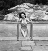 Beautiful woman in bikini at swimming pool Poster Print - Item # VARSAL255418138