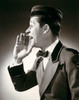 Side profile of a bellhop shouting Poster Print - Item # VARSAL25518681B