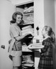 Daughter helping her mother Poster Print - Item # VARSAL25542771
