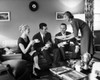 Friends drinking tea and talking in living room Poster Print - Item # VARSAL25525712