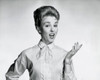 Portrait of a mid adult woman gesturing Poster Print - Item # VARSAL25511490