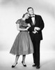 Young couple standing together Poster Print - Item # VARSAL2555786B
