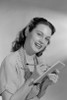 Portrait of smiling housewife with shopping list Poster Print - Item # VARSAL255419787A