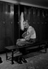 Man getting dressed in locker room Poster Print - Item # VARSAL255418973