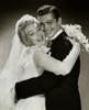 Portrait of a newlywed couple embracing Poster Print - Item # VARSAL255754