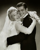 Portrait of a newlywed couple embracing Poster Print - Item # VARSAL255754