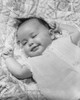 High angle view of a baby girl smiling and sleeping Poster Print - Item # VARSAL2559642B