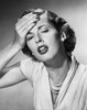Close-up of a young woman suffering from a headache Poster Print - Item # VARSAL25511600C