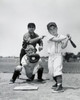 Two boys playing baseball with a baseball umpire standing behind them Poster Print - Item # VARSAL25520389