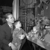 Father and son watching window display Poster Print - Item # VARSAL255420807