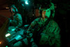 Pilots sitting in the cockpit of a UH-60 Black Hawk helicopter at Davis Monthan Air Force Base, Arizona Poster Print - Item # VARPSTTMO100900M