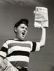 Low angle view of a boy selling newspapers Poster Print - Item # VARSAL25527392