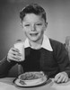 Portrait of a boy holding a glass of milk Poster Print - Item # VARSAL25513263A