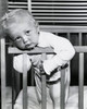 Close-up of a baby boy leaning over a crib Poster Print - Item # VARSAL2559650