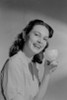 Portrait of smiling woman holding coffee cup Poster Print - Item # VARSAL255419709