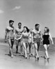 Three teenage couples walking on beach Poster Print - Item # VARSAL2553223