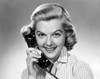 Portrait of a young woman talking on the telephone Poster Print - Item # VARSAL25511148B