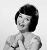 Close-up of a young woman smiling with her hands clasped Poster Print - Item # VARSAL25510567