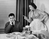 Woman scolding man at dining table Poster Print - Item # VARSAL25541416