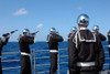 Persian Gulf, September 15, 2006 - Sailors fire a gun salute during a burial-at-sea aboard guided missile cruiser USS Bunker Hill. Poster Print - Item # VARPSTSTK101598M