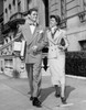 Young couple walking on sidewalk Poster Print - Item # VARSAL2552959