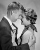 Side profile of a young couple embracing each other Poster Print - Item # VARSAL2554991