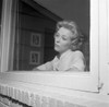 Woman looking out window Poster Print - Item # VARSAL255417553