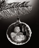 Close-up of an image of a girl with Christmas presents superimposed on a Christmas ornament Poster Print - Item # VARSAL2553526
