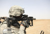 U.S. Army soldier scans the horizon through the scope of a M4 carbine Poster Print - Item # VARPSTSTK104417M