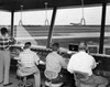 Rear view of four technicians working in an air traffic control tower  Sarasota-Bradenton International Airport  Sarasota  Florida  USA Poster Print - Item # VARSAL25526592A